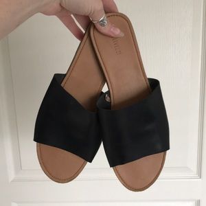 Black leather slides